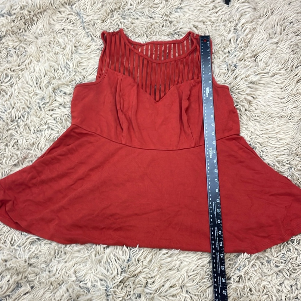 Torrid peplum orange with sheer top